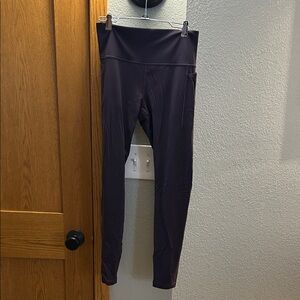 Athleta Transcend Stash High Rise Legging.